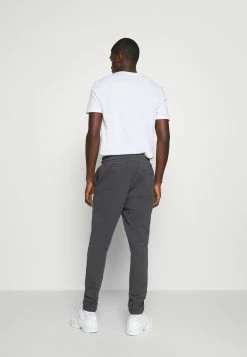 YOURTURN Prix Bradés Loose Fit UNISEX - Pantalon de survêtement trouser Normale all -YOURTURN Soldes 2022 03e64fcce775408a9e7aa2a9ae2a98c6