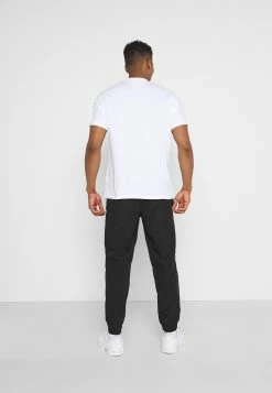 YOURTURN Bon Rapport Coût-Efficacité UNISEX - Pantalon de survêtement trouser Normale all -YOURTURN Soldes 2022 84d2f3ac913541f9b4e3212b19786e01